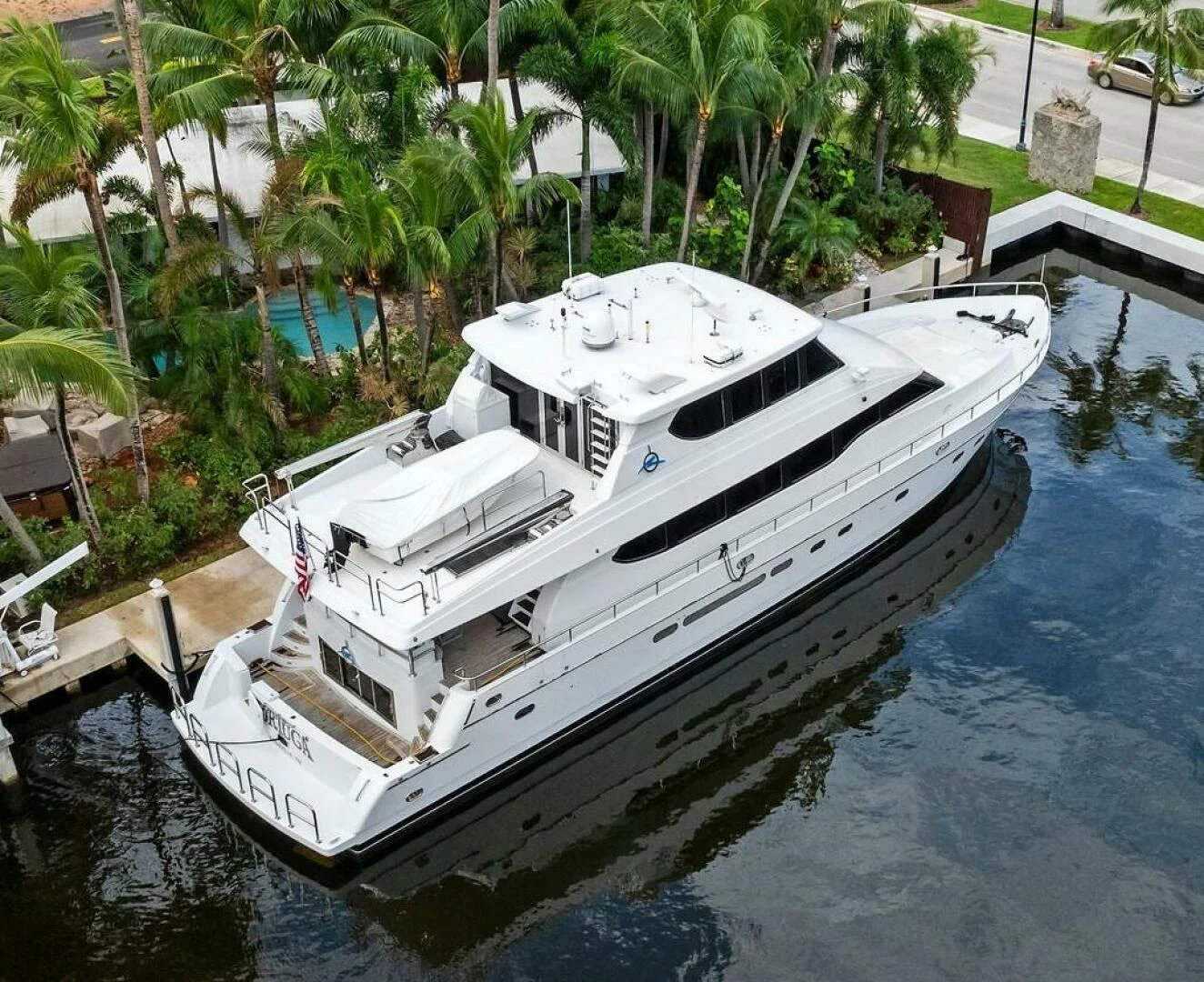 a boat docked in a body of water aboard TORTUGA Yacht for Sale