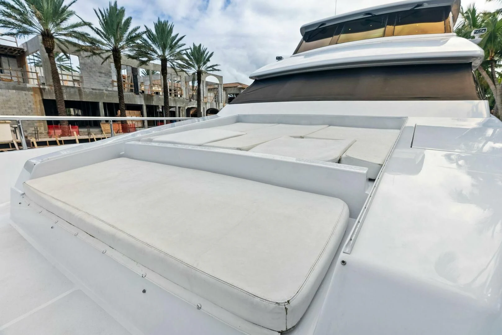 a white car with a roof aboard TORTUGA Yacht for Sale