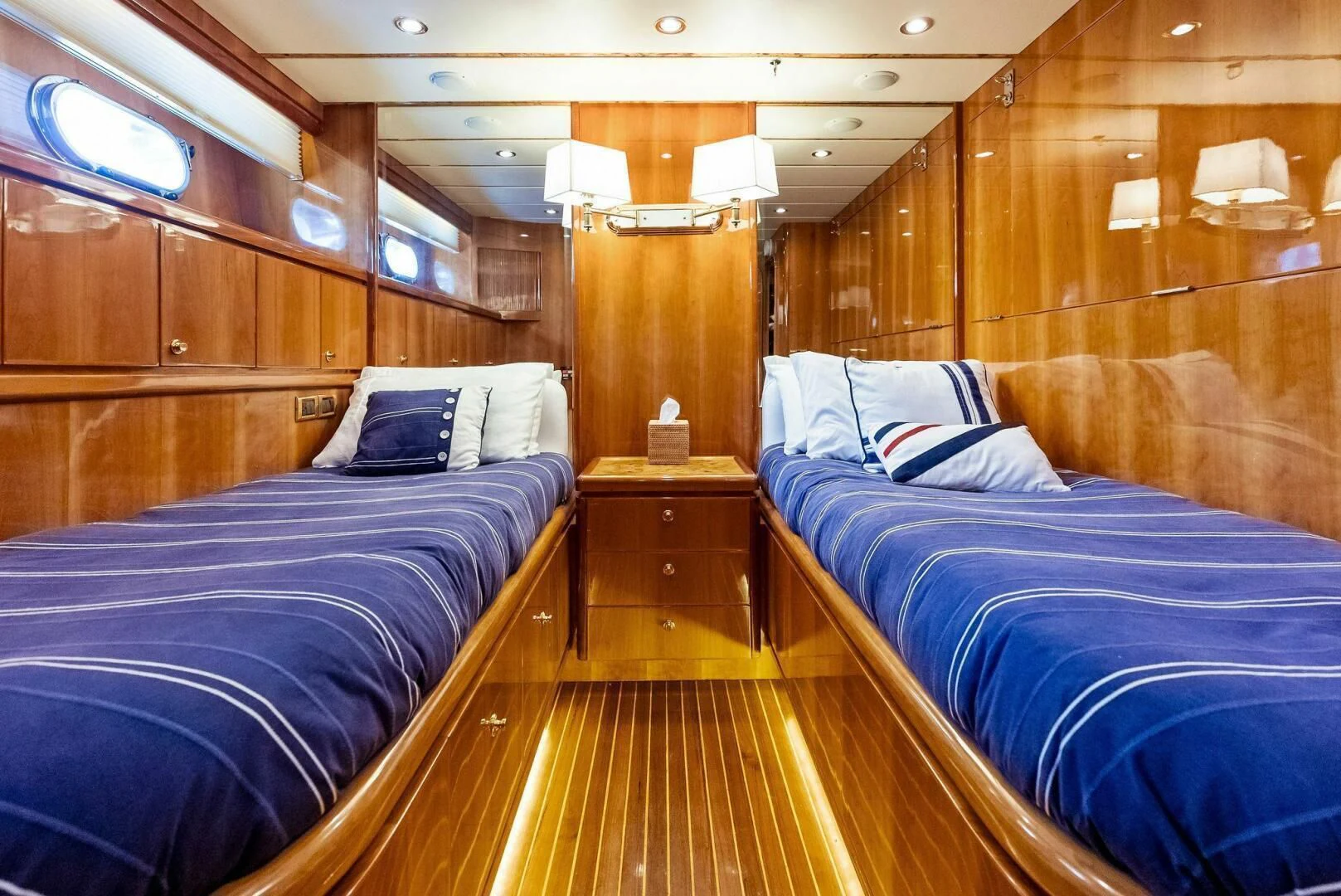a room with two beds aboard TORTUGA Yacht for Sale