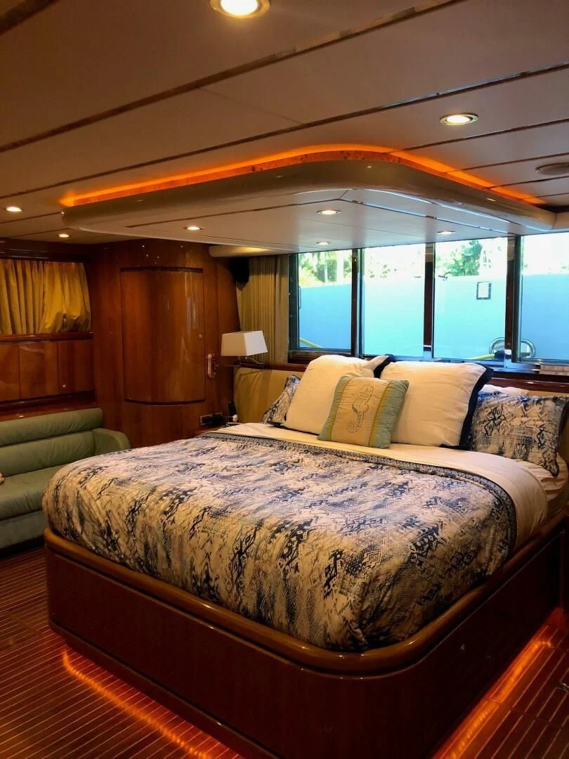 a bed in a room aboard TORTUGA Yacht for Sale