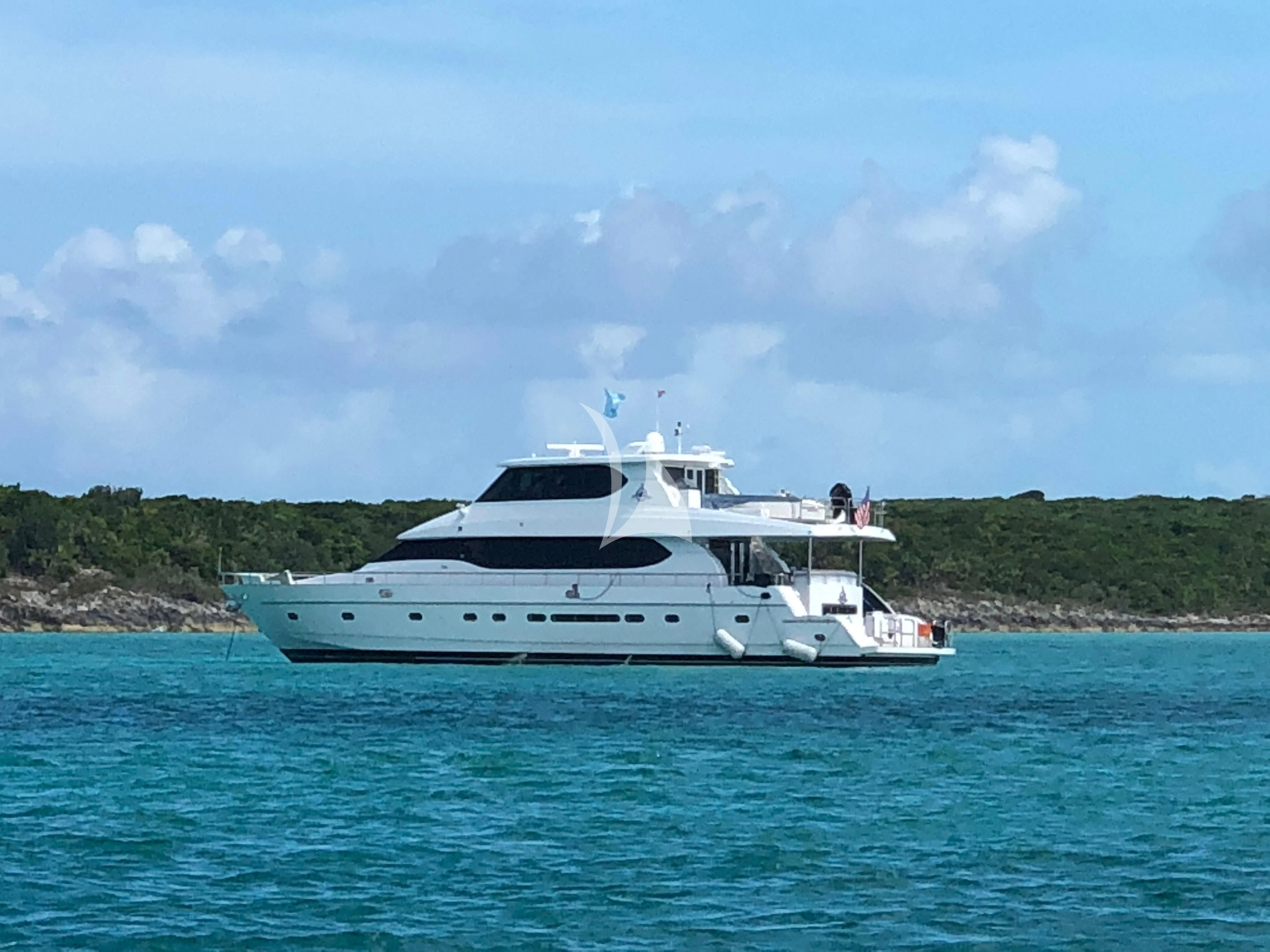 a white yacht in the water aboard TORTUGA Yacht for Sale