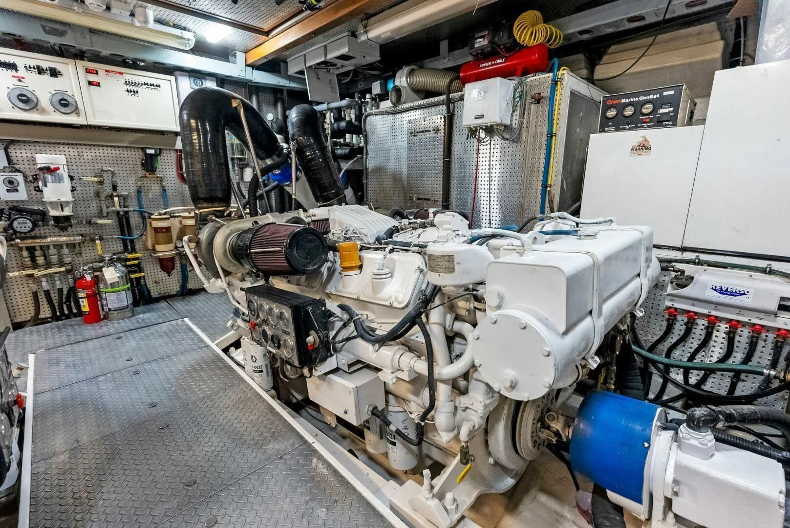 a large machine in a factory aboard TORTUGA Yacht for Sale