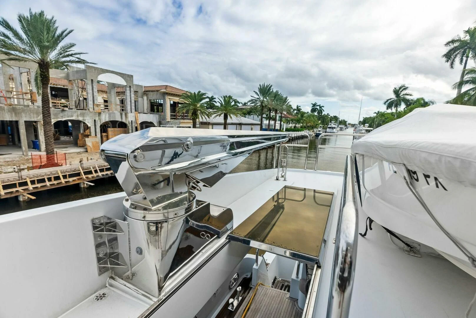 a boat parked on the side of a road aboard TORTUGA Yacht for Sale