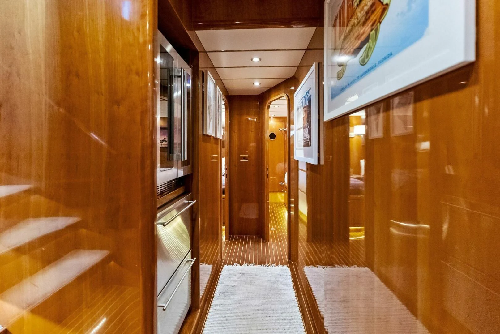 a hallway with doors aboard TORTUGA Yacht for Sale