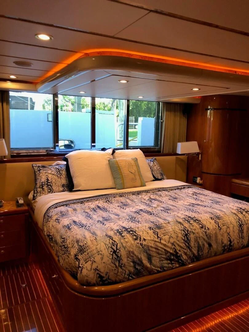 a bed with pillows aboard TORTUGA Yacht for Sale