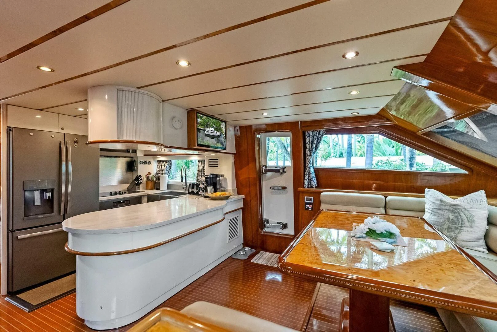 a kitchen with a large island aboard TORTUGA Yacht for Sale