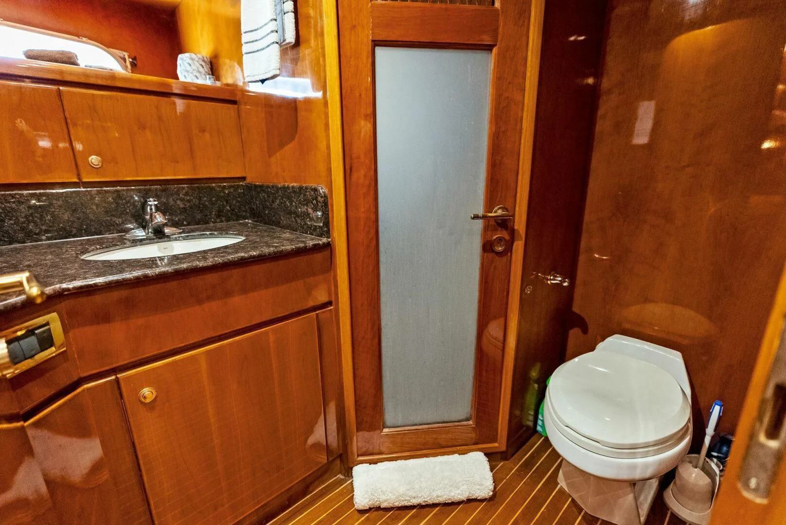 a bathroom with a sink and toilet aboard TORTUGA Yacht for Sale