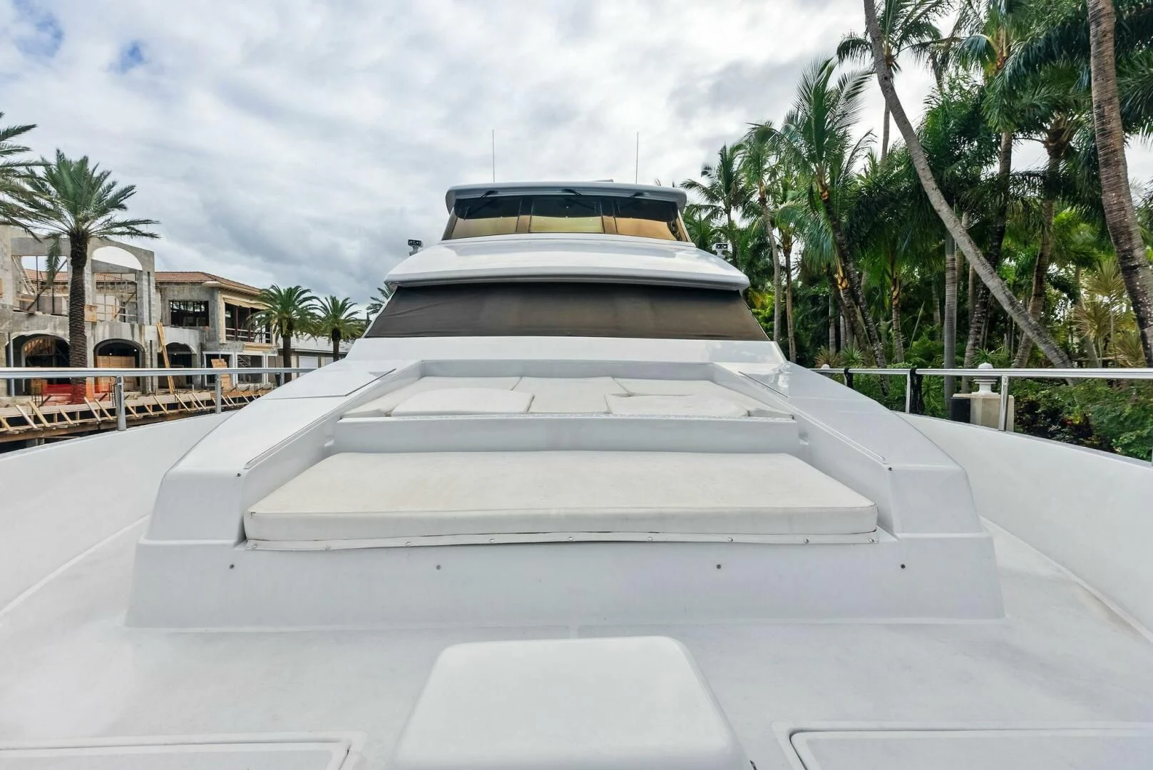 a white building with a black roof aboard TORTUGA Yacht for Sale