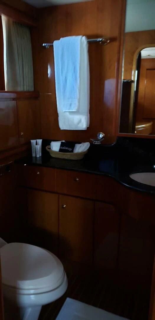 a bathroom with a sink and toilet aboard TORTUGA Yacht for Sale