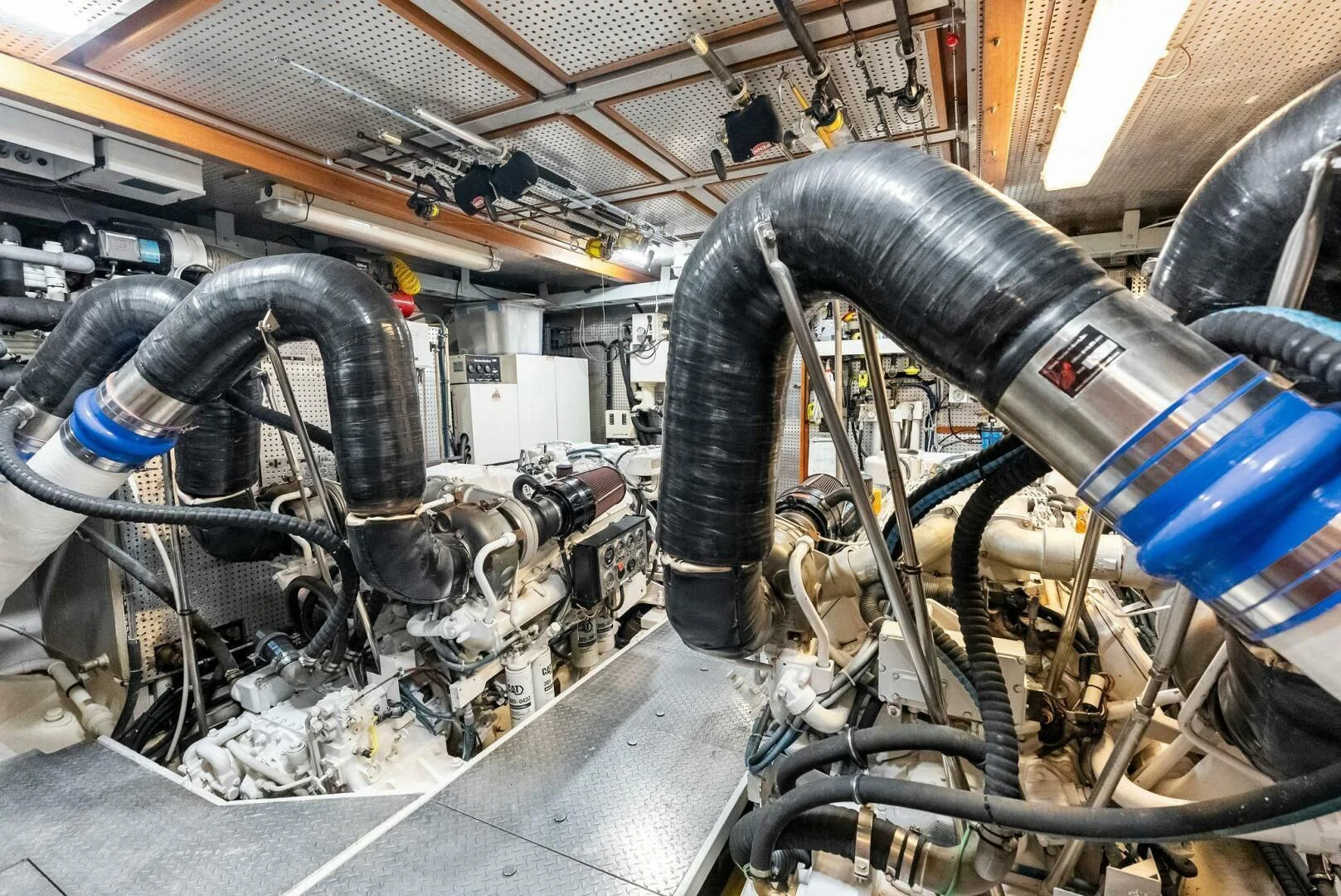 a machine with a large metal pipe aboard TORTUGA Yacht for Sale