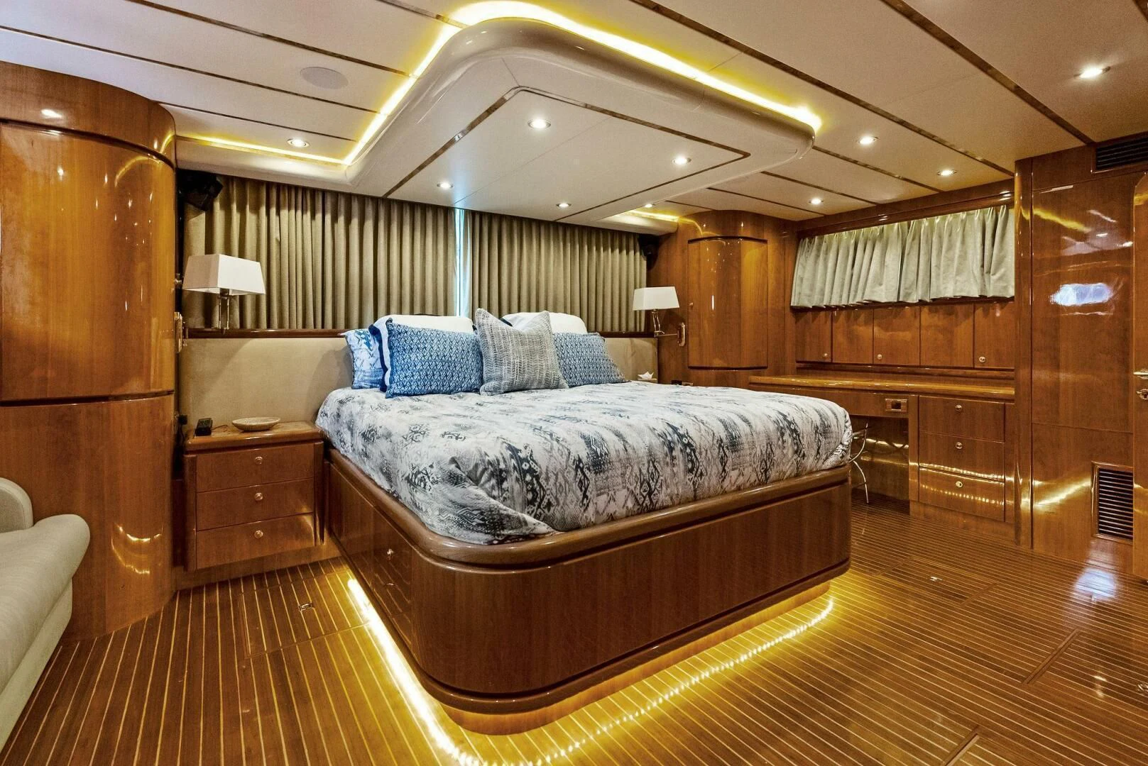 a large bed in a room aboard TORTUGA Yacht for Sale