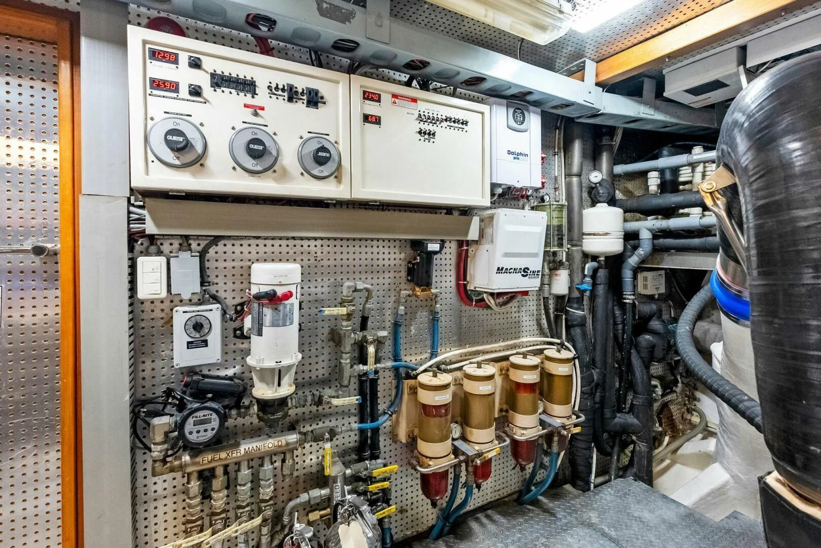 a machine in a factory aboard TORTUGA Yacht for Sale