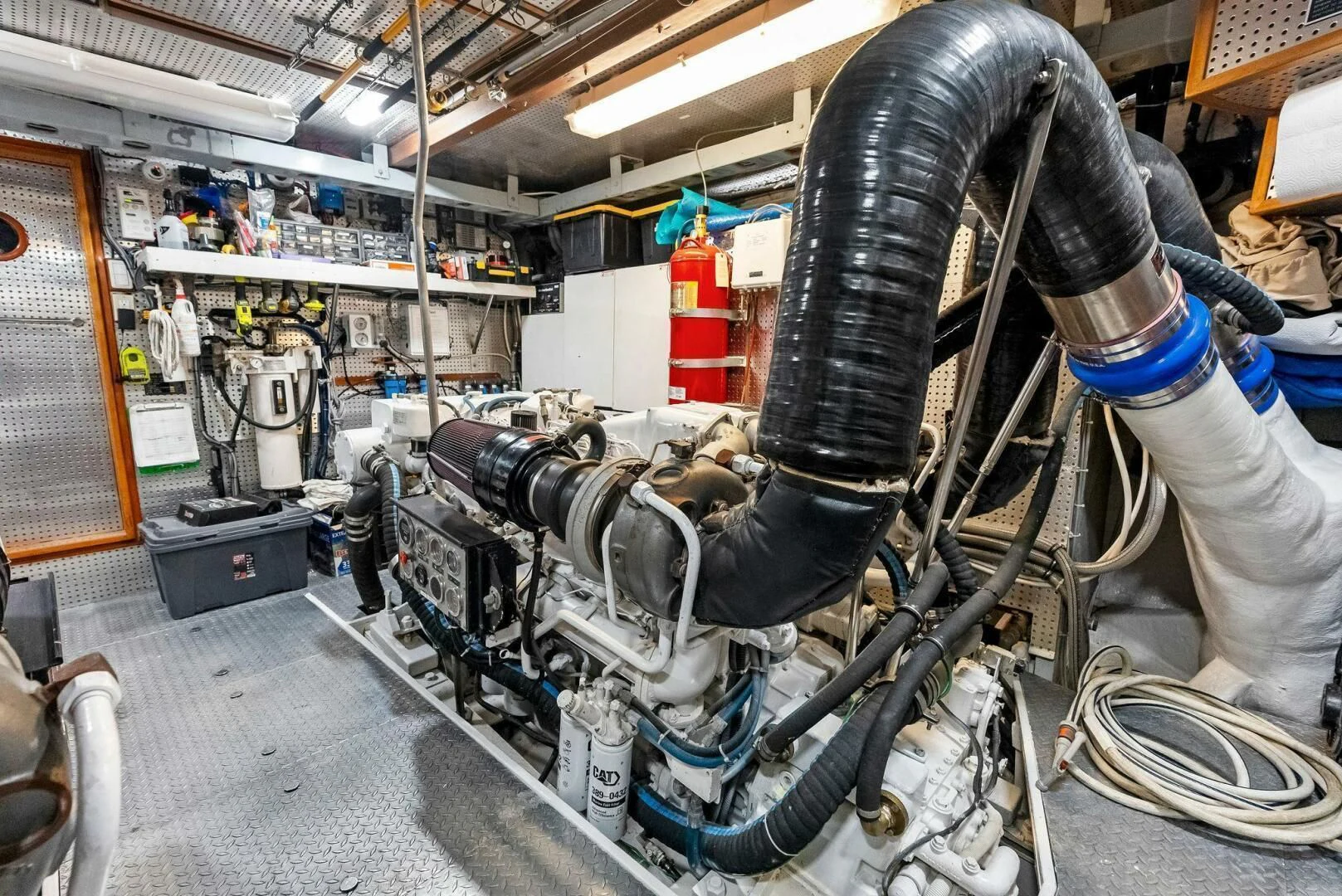 a machine with a large metal pipe aboard TORTUGA Yacht for Sale