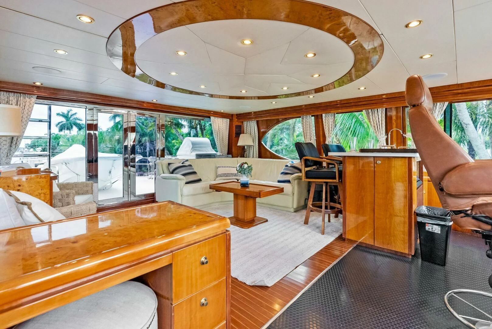a room with a table and chairs aboard TORTUGA Yacht for Sale