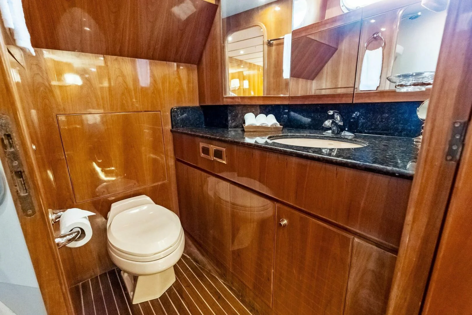 a bathroom with a sink and a toilet aboard TORTUGA Yacht for Sale