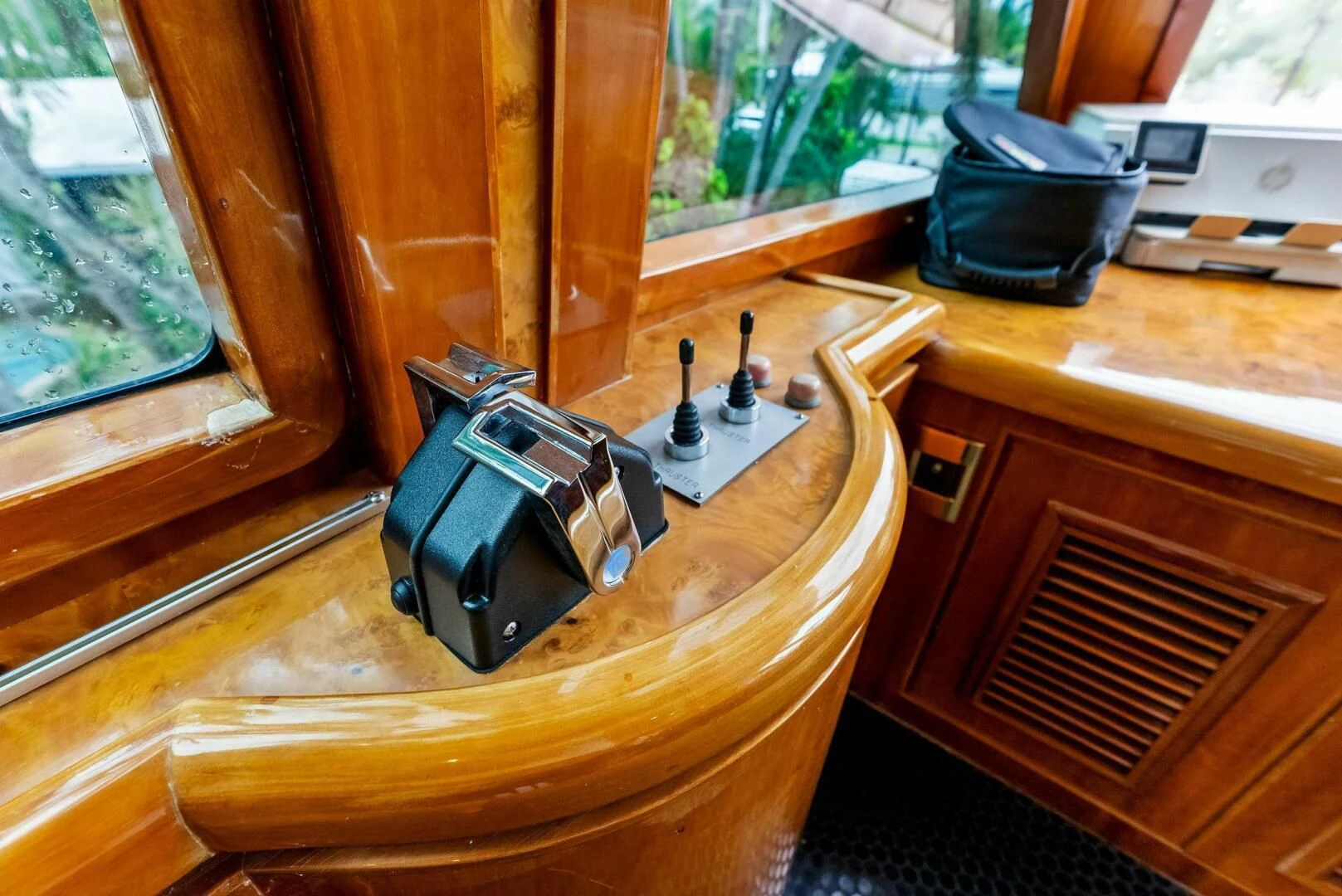a black helmet on a table aboard TORTUGA Yacht for Sale