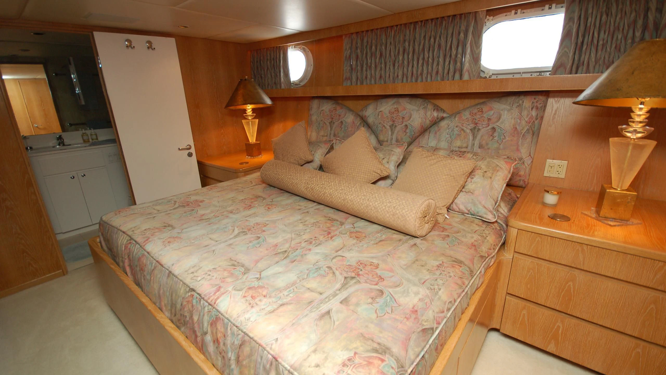 a bed in a room aboard CONTRARIAN ROSE Yacht for Sale