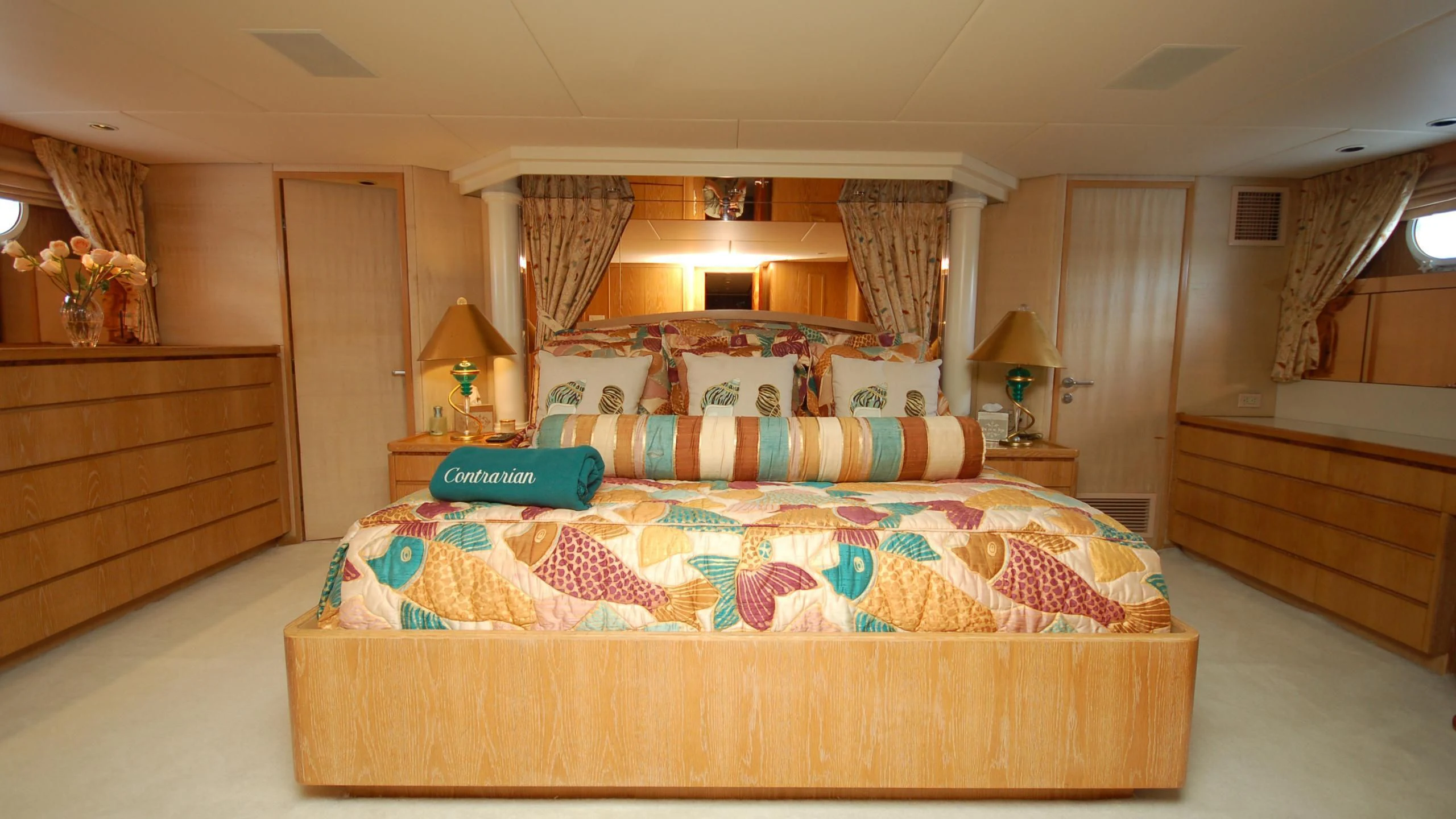 a bed in a room aboard CONTRARIAN ROSE Yacht for Sale