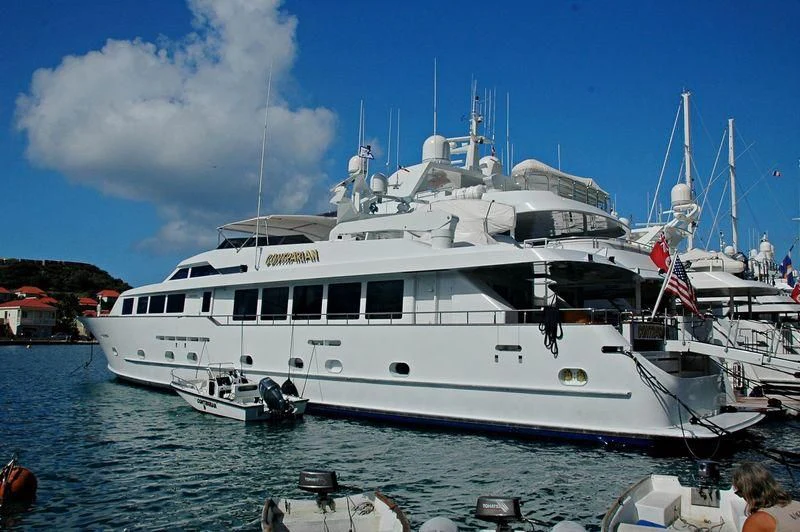 a large white boat in the water aboard CONTRARIAN ROSE Yacht for Sale