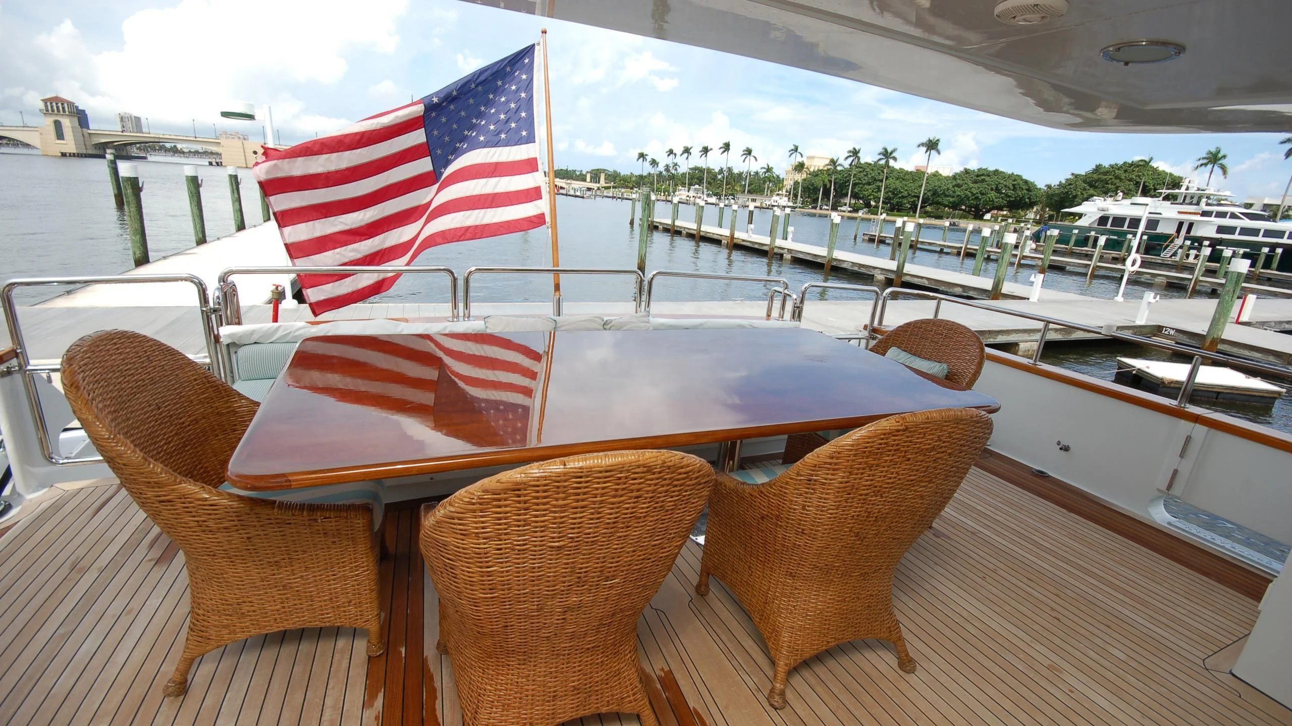 a table with a flag on it aboard CONTRARIAN ROSE Yacht for Sale