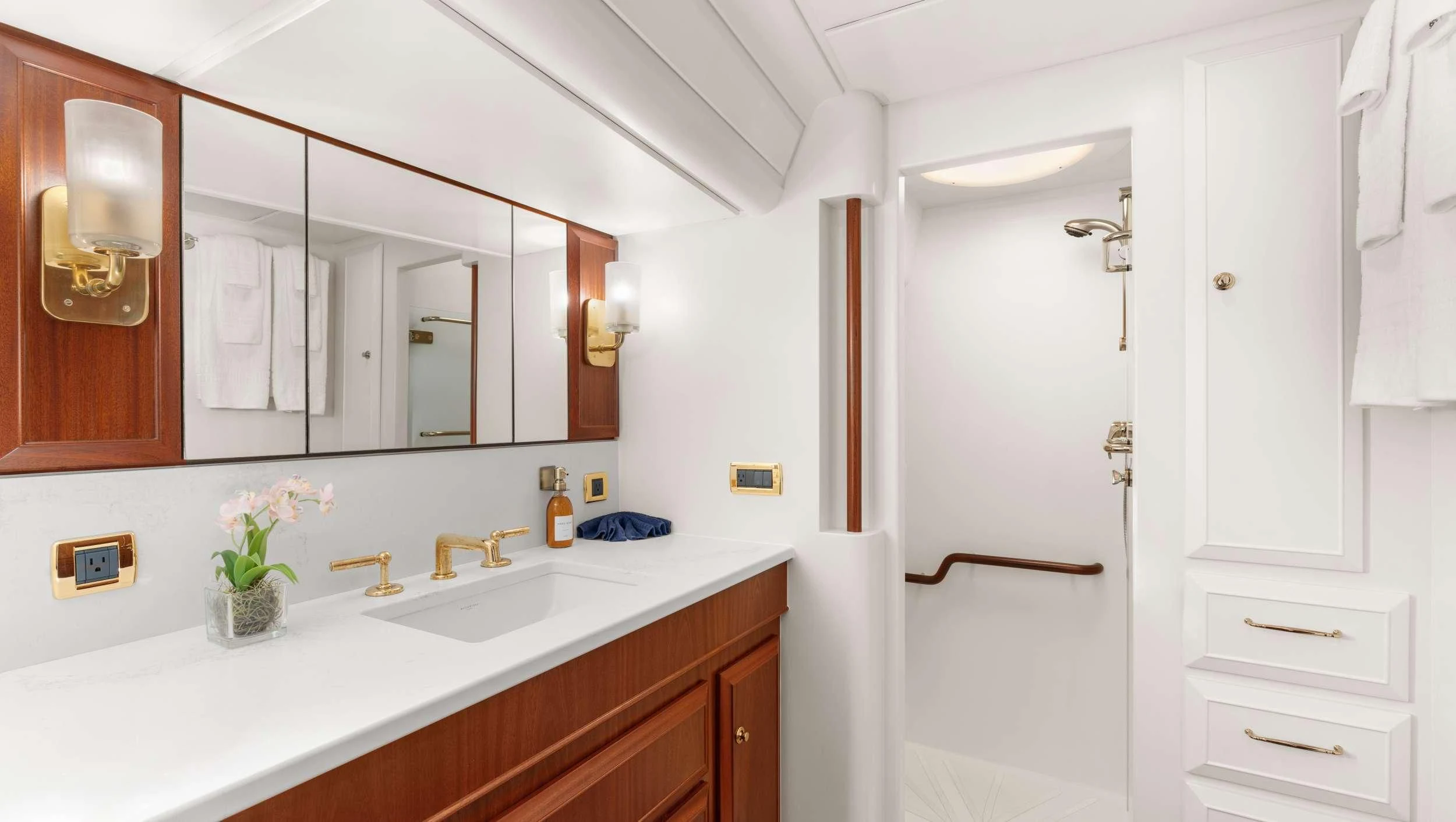 a bathroom with a white door aboard ABIDE Yacht for Sale