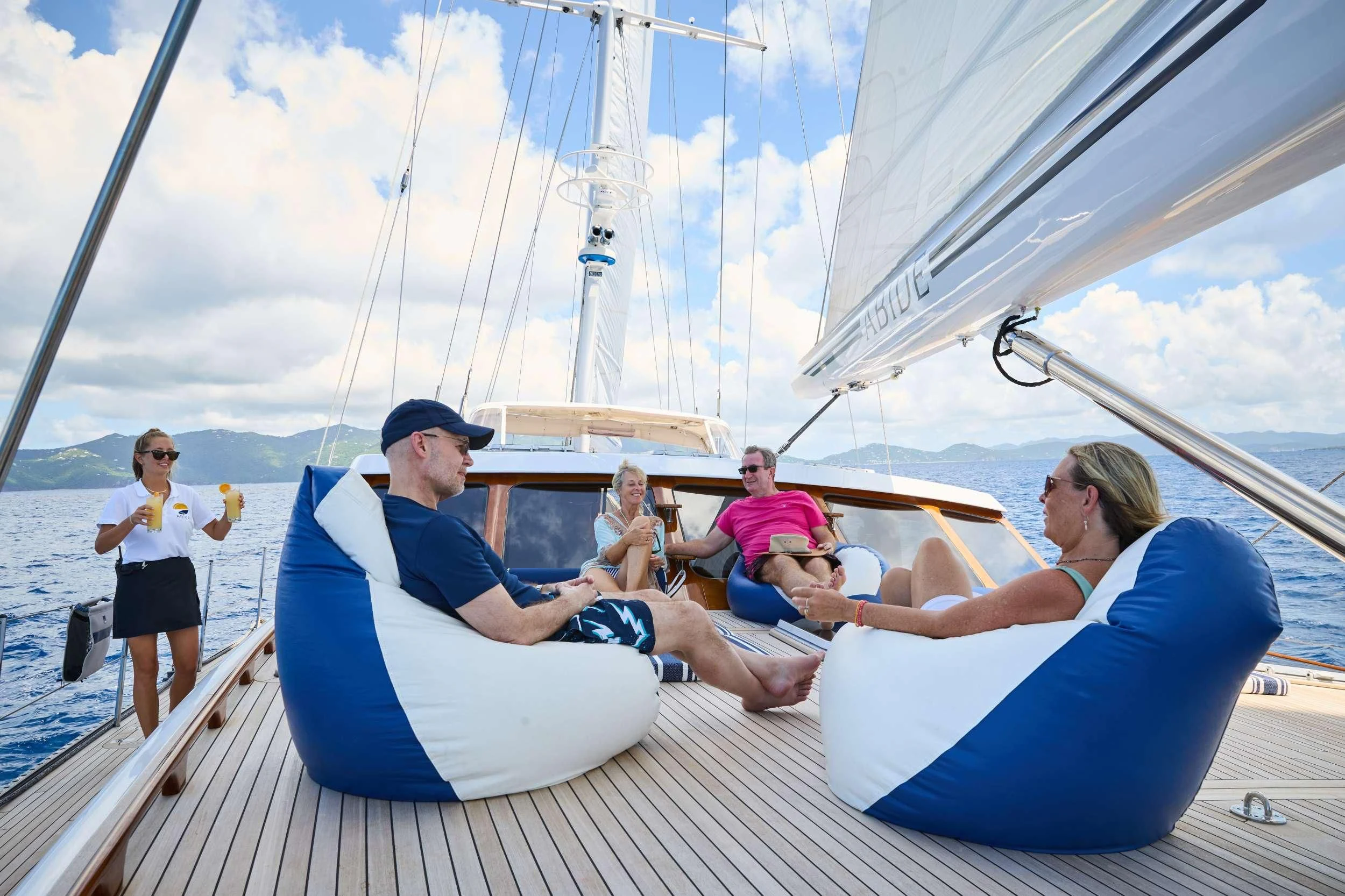 a group of people on a sailboat aboard ABIDE Yacht for Sale