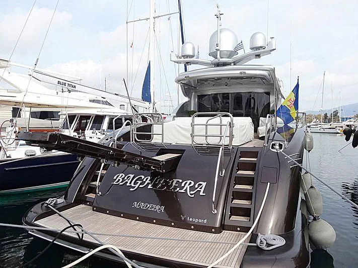 a boat with a flag on it aboard BAGHEERA Yacht for Sale
