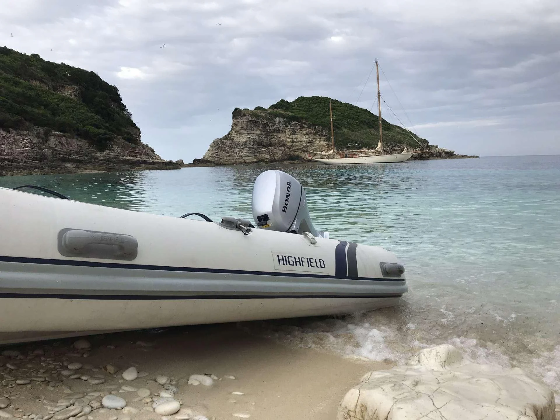 a boat on the beach aboard HALCYON Yacht for Sale