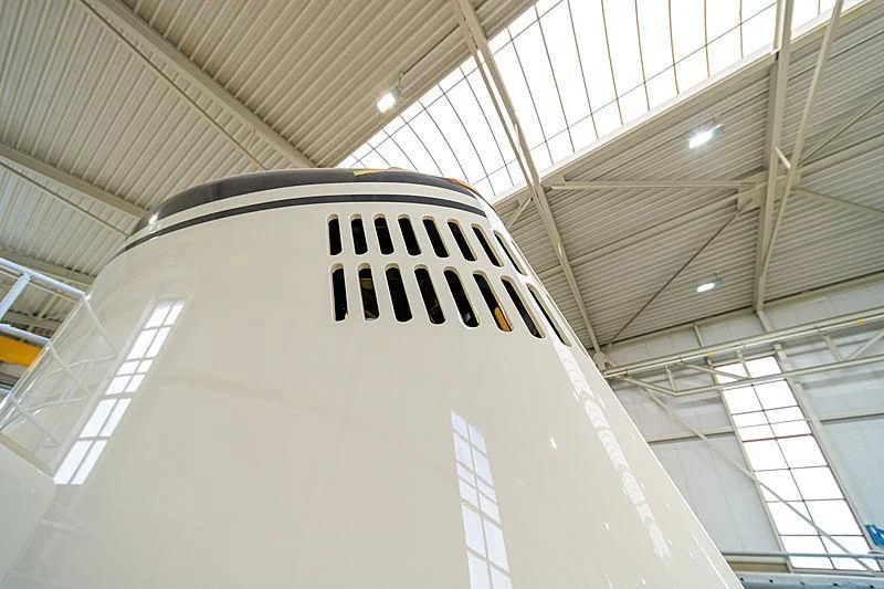 a white train in a building aboard ISTROS Yacht for Sale