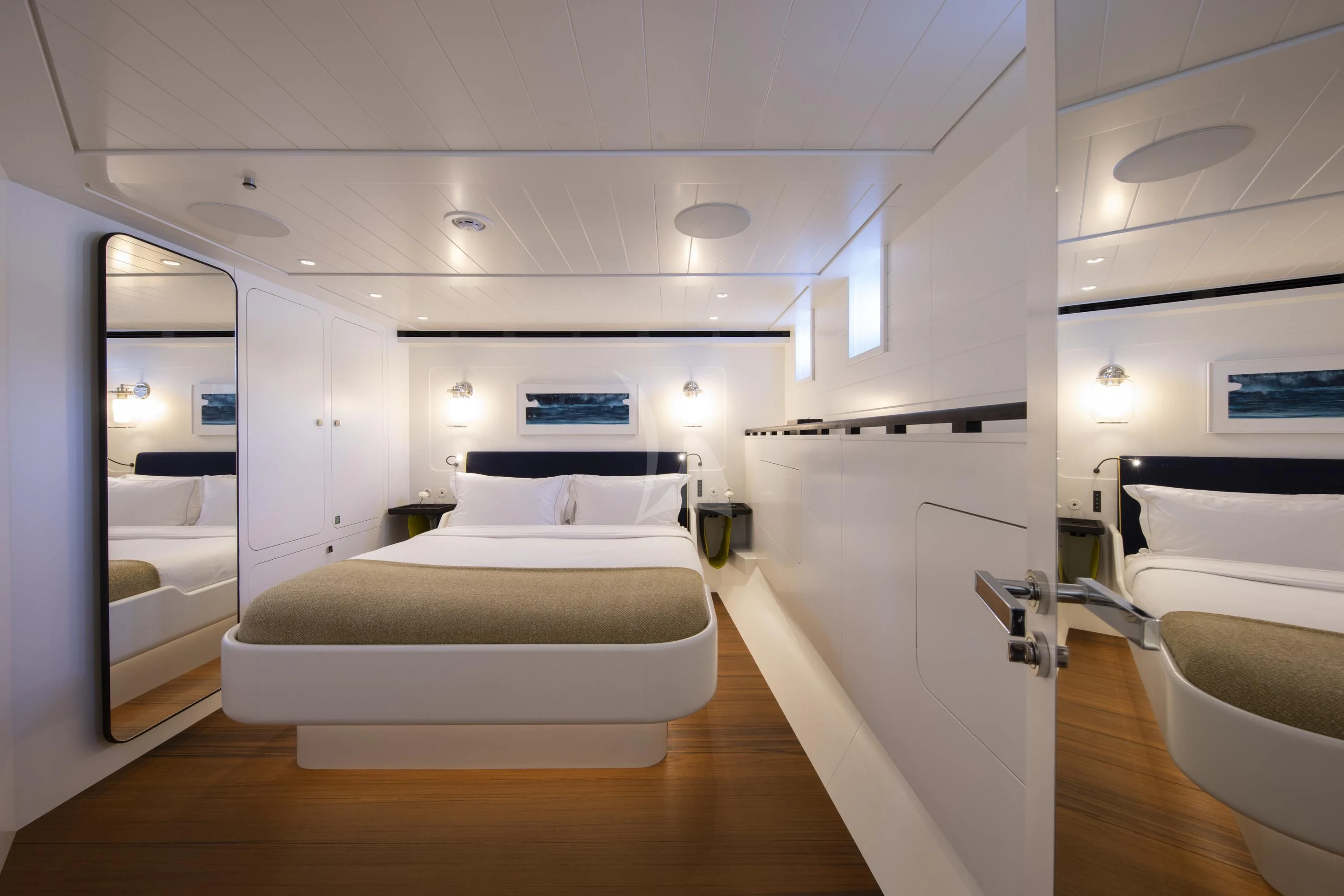 a room with a bed and a desk aboard ISTROS Yacht for Sale