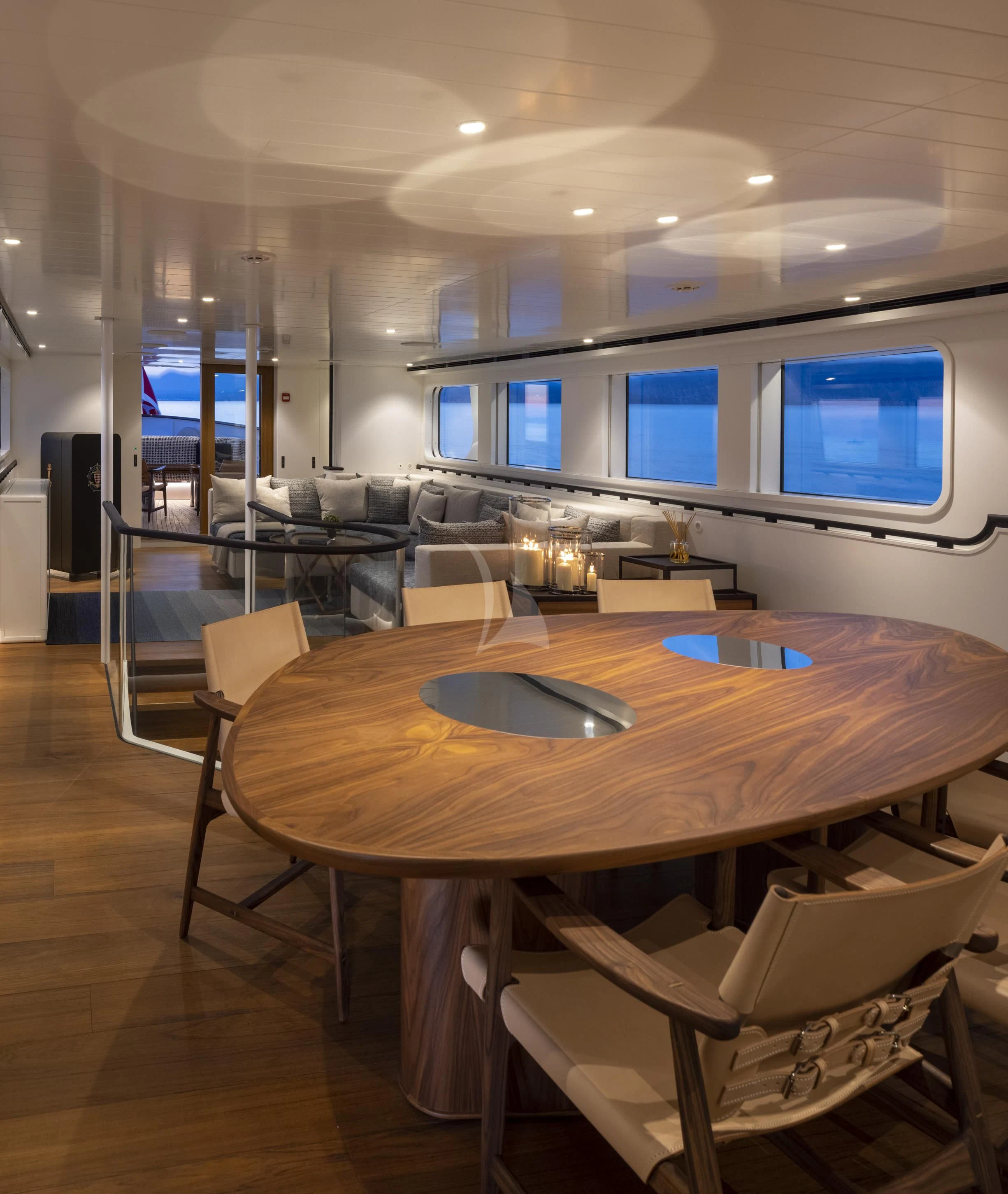a conference room with tables and chairs aboard ISTROS Yacht for Sale