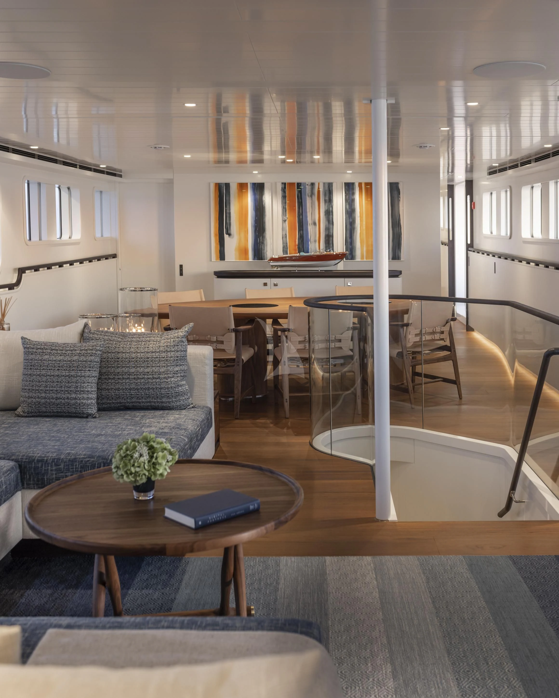 a living room with a couch and a table aboard ISTROS Yacht for Sale