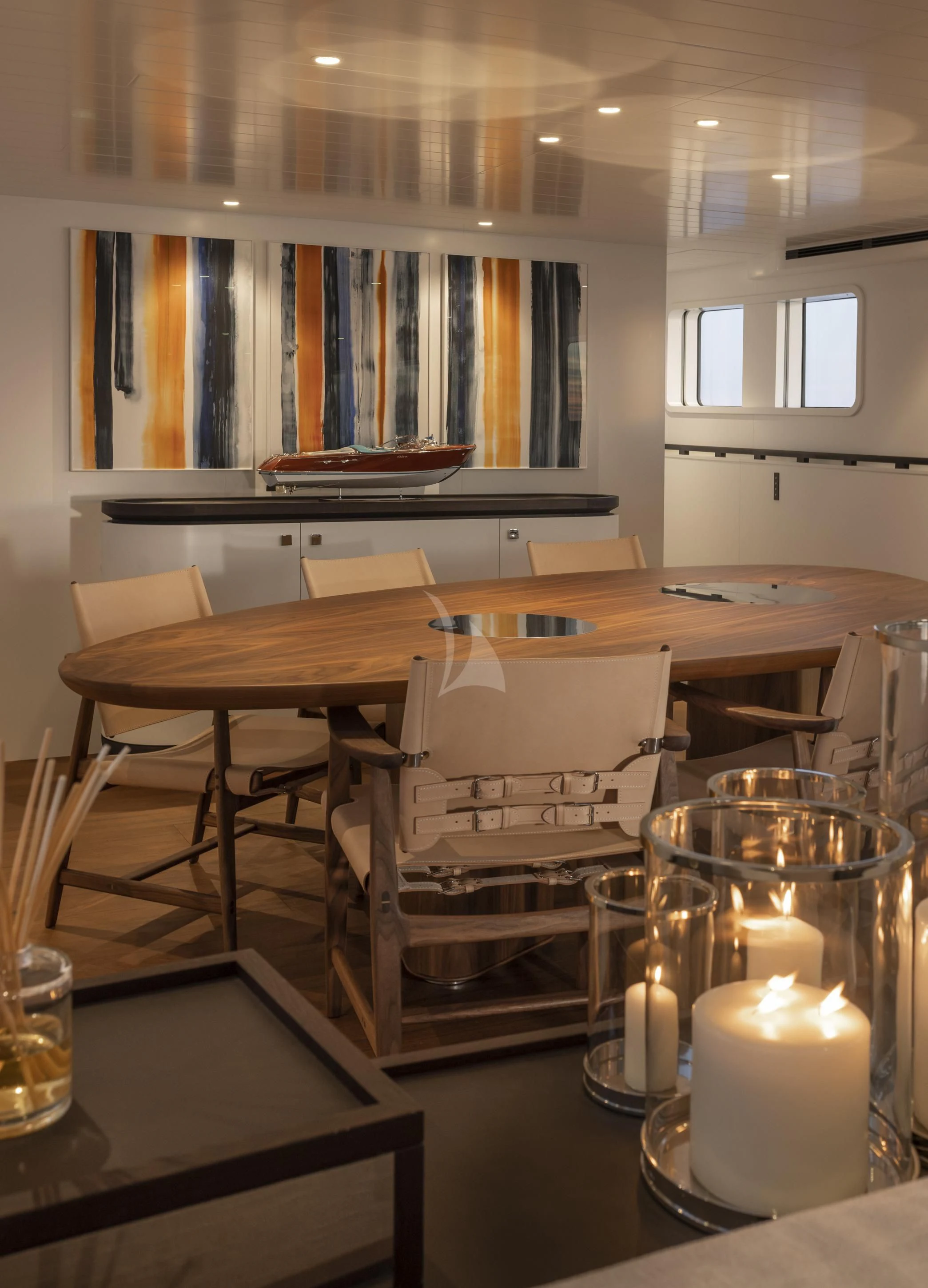 a table with candles on it aboard ISTROS Yacht for Sale