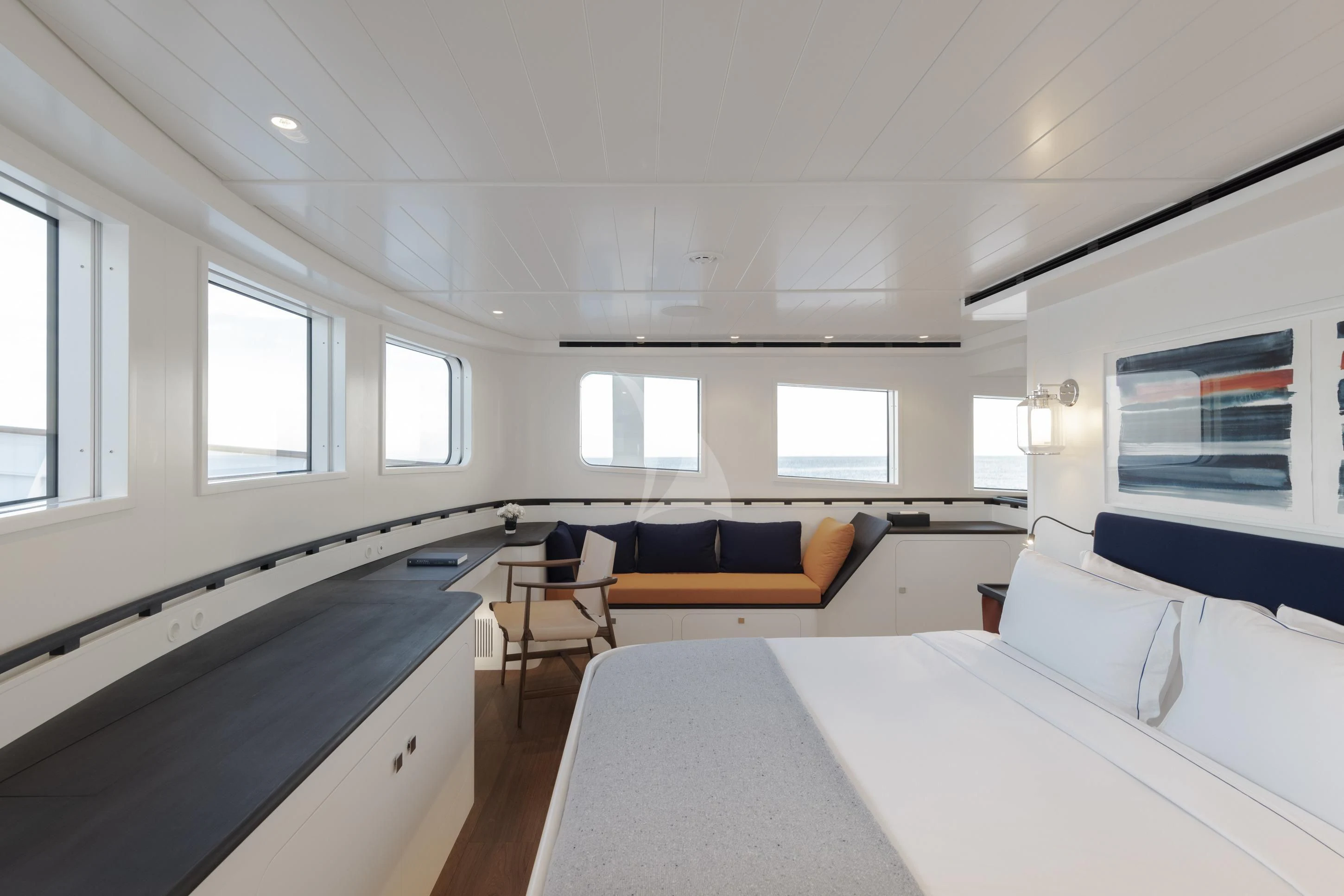 a room with a bed and a desk aboard ISTROS Yacht for Sale