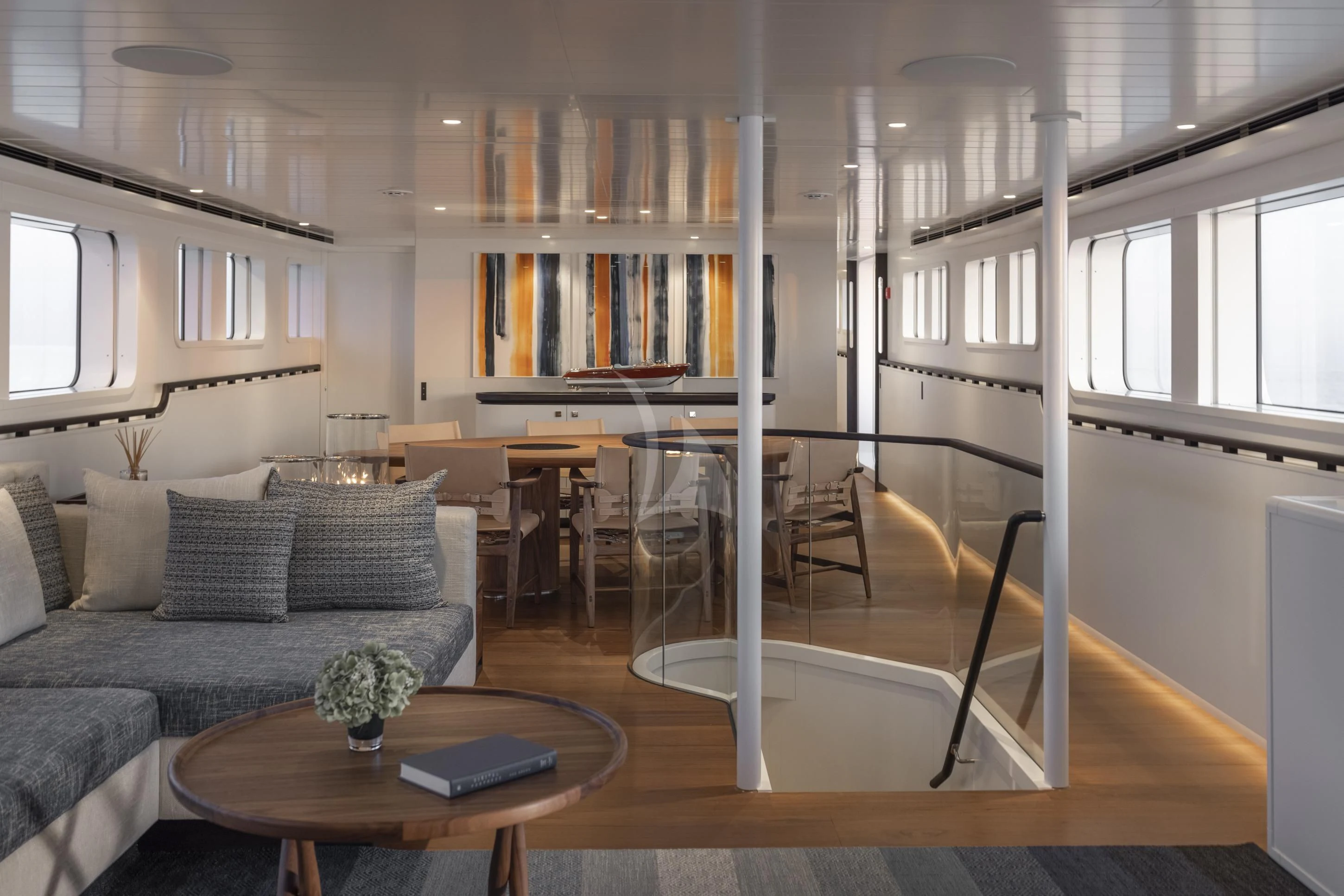 a living room with a couch and a table aboard ISTROS Yacht for Sale