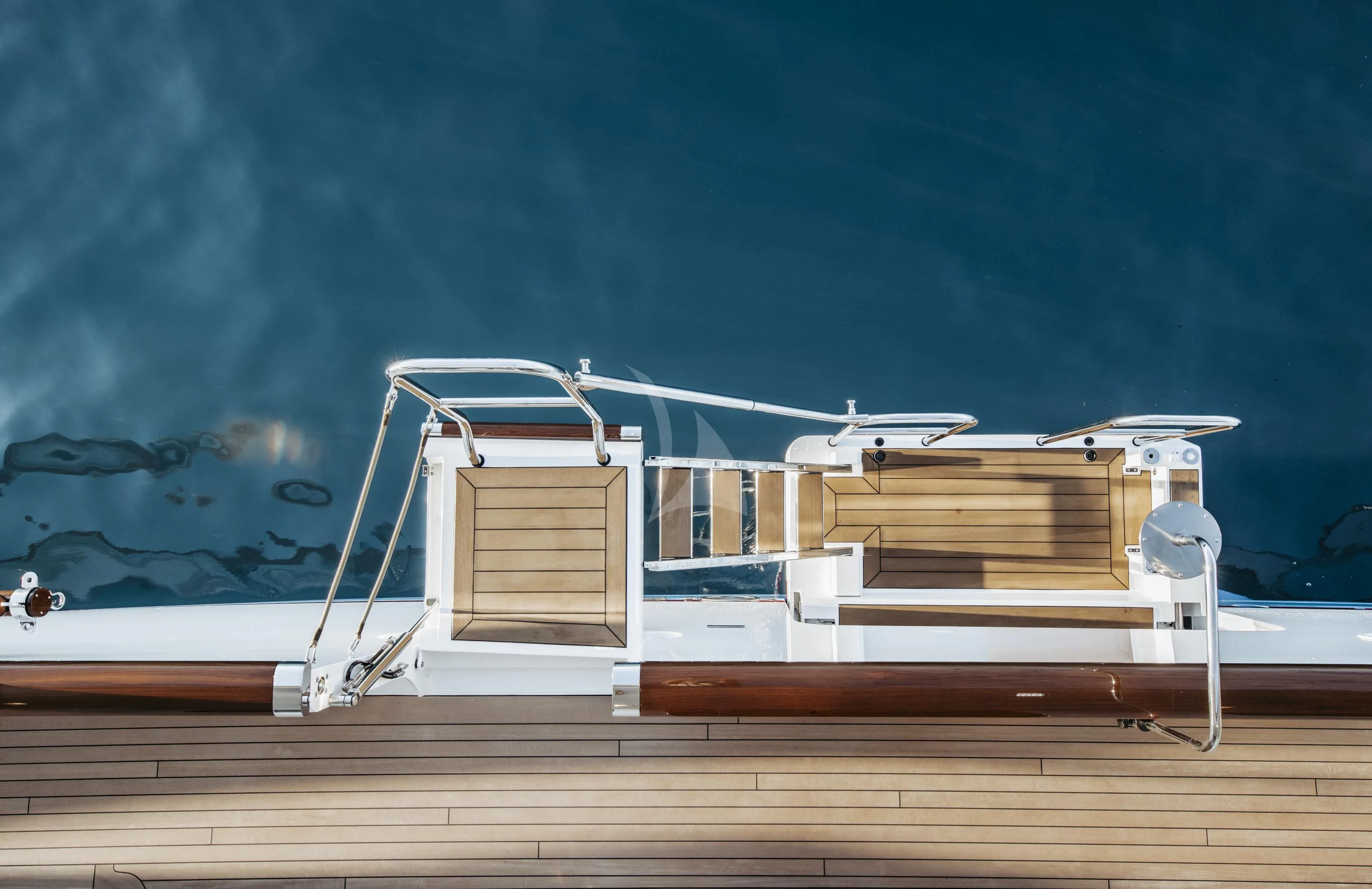 a white boat on a dock aboard ISTROS Yacht for Sale