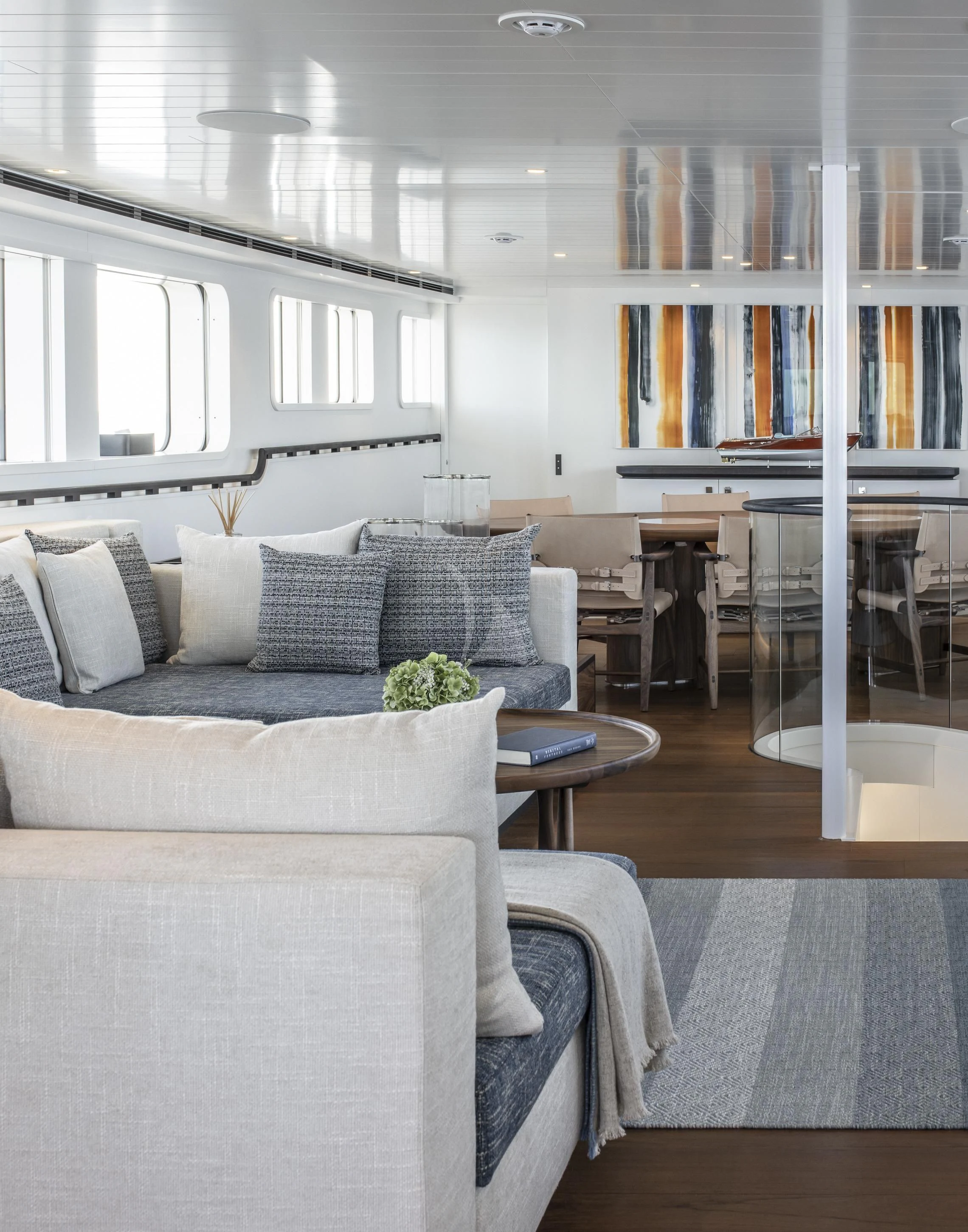 a living room with a couch and a table aboard ISTROS Yacht for Sale