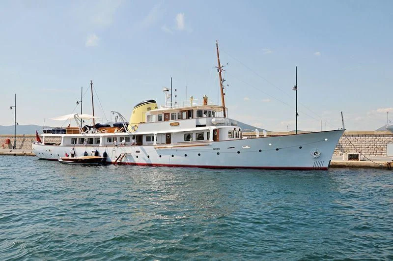 a large white boat in the water aboard ISTROS Yacht for Sale