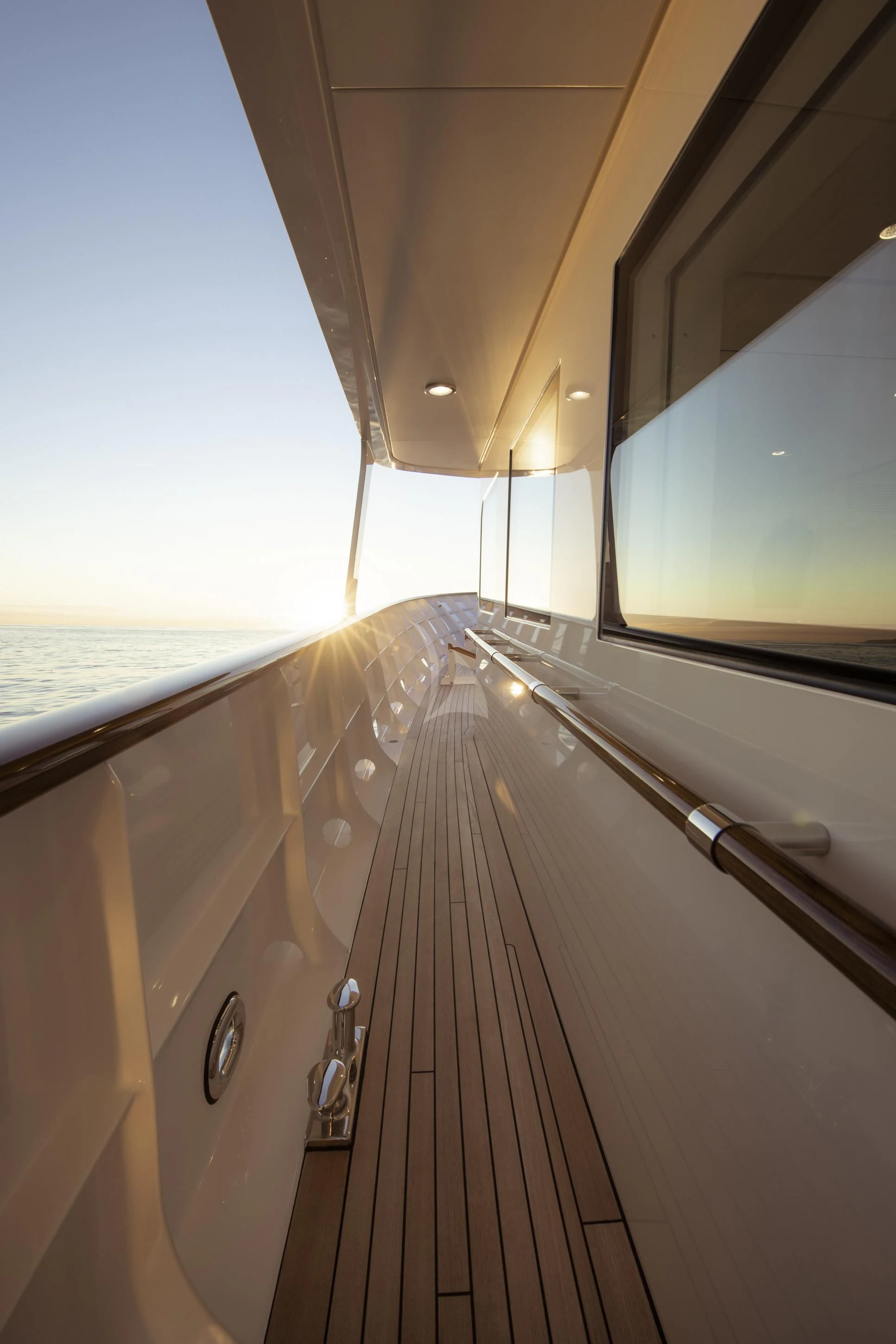 a long hallway with a window aboard ISTROS Yacht for Sale