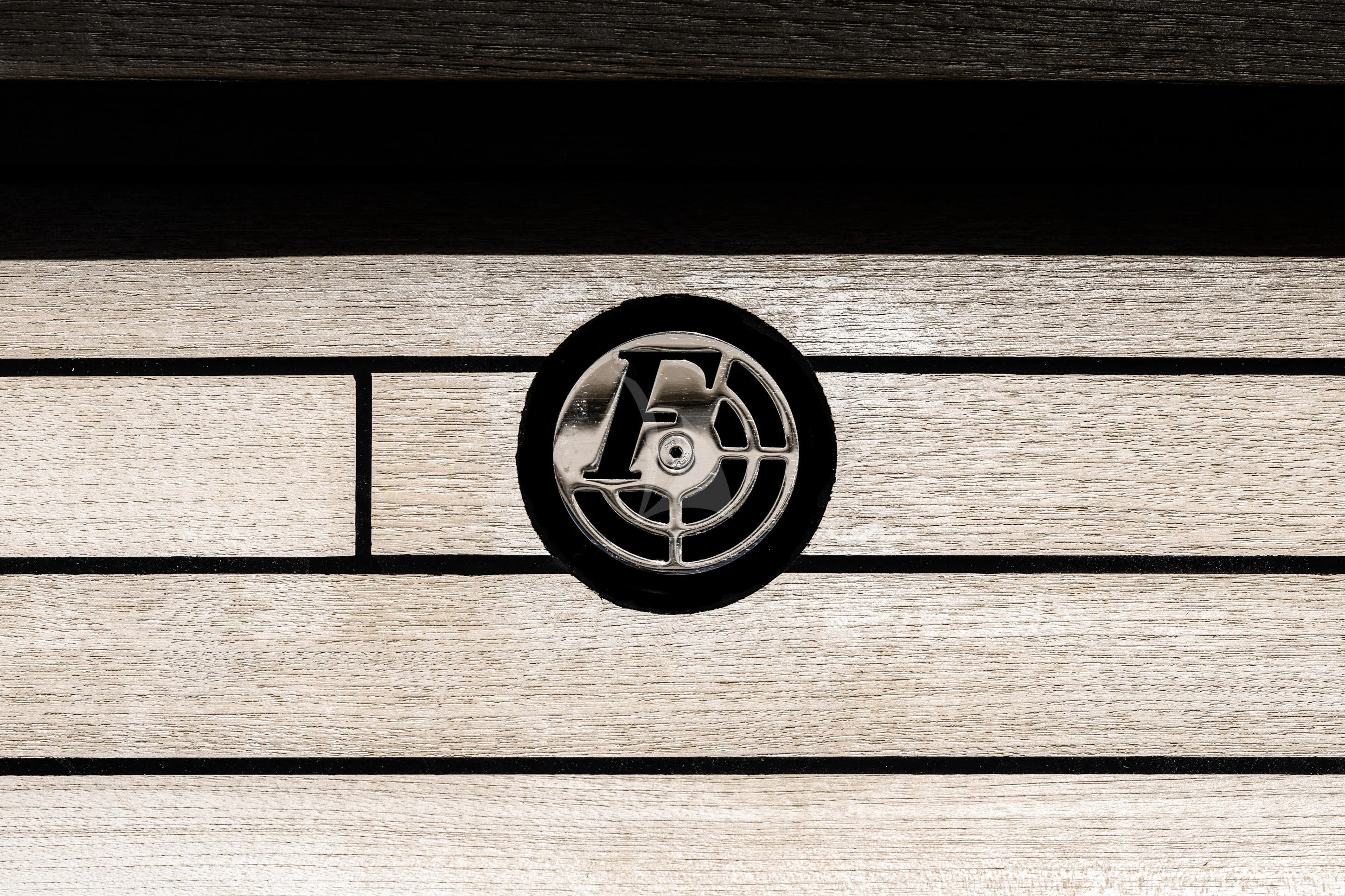 a tire on a wooden surface aboard ISTROS Yacht for Sale