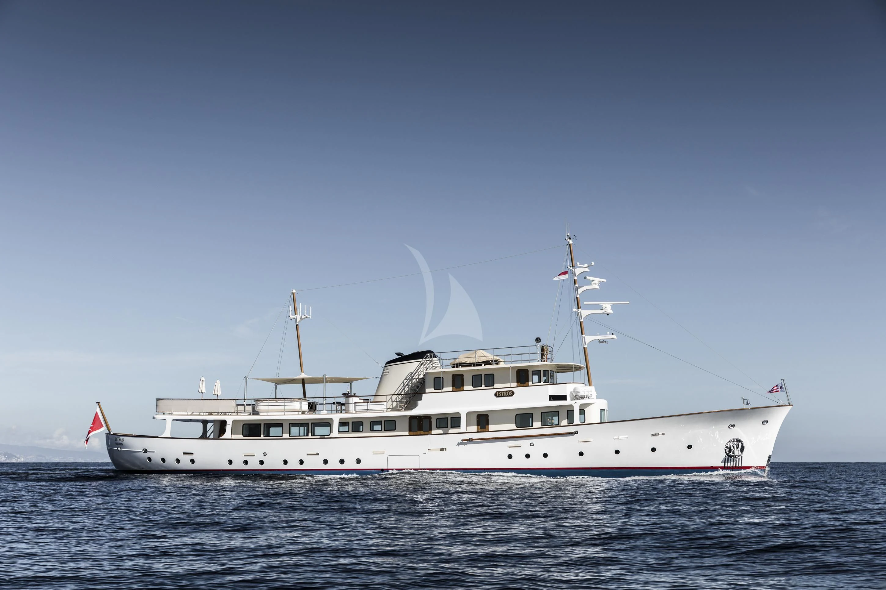 a large white boat in the water aboard ISTROS Yacht for Sale