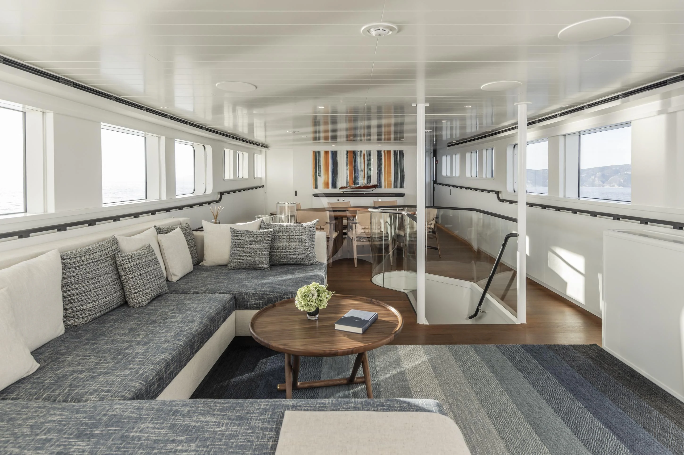 a living room with a couch and a coffee table aboard ISTROS Yacht for Sale
