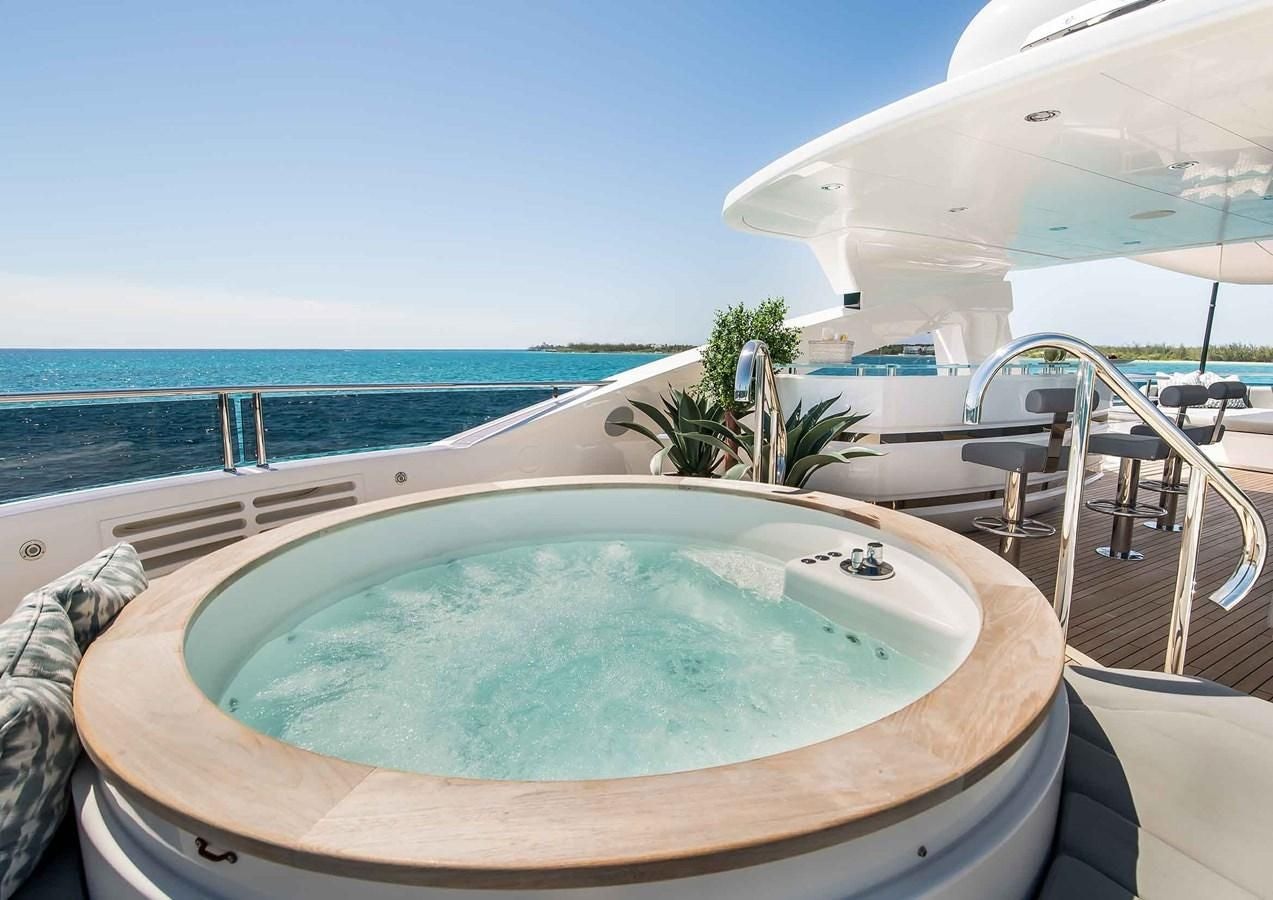 a pool on a deck aboard CAPTAIN MORGAN III Yacht for Sale