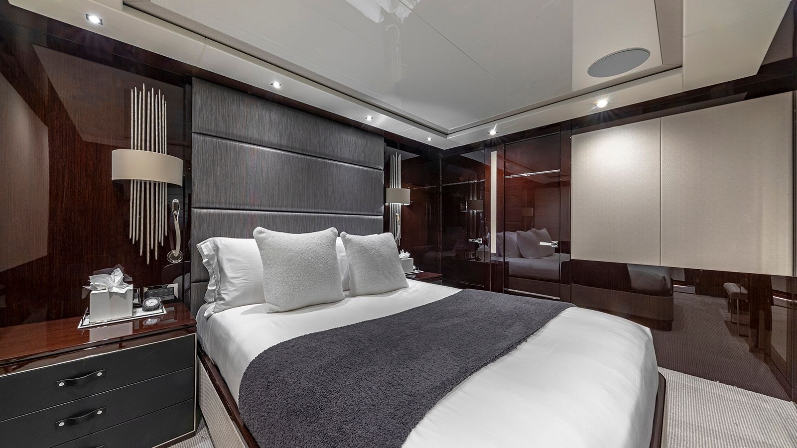 a bed in a room aboard CAPTAIN MORGAN III Yacht for Sale