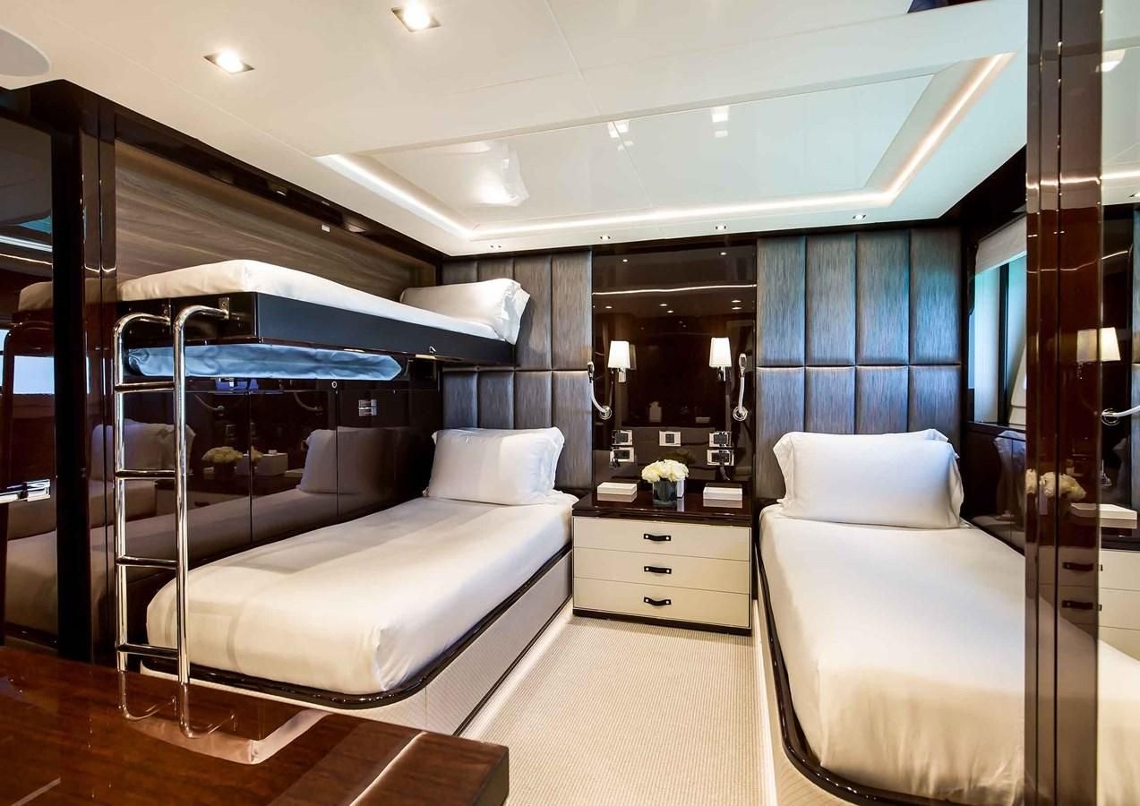a bedroom with a bunk bed aboard CAPTAIN MORGAN III Yacht for Sale