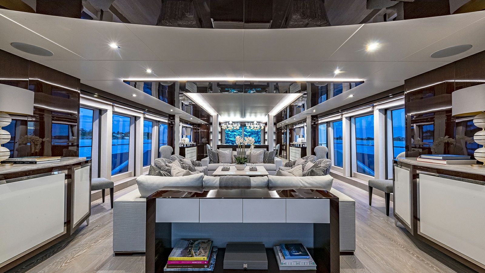 a room with a table and chairs aboard CAPTAIN MORGAN III Yacht for Sale