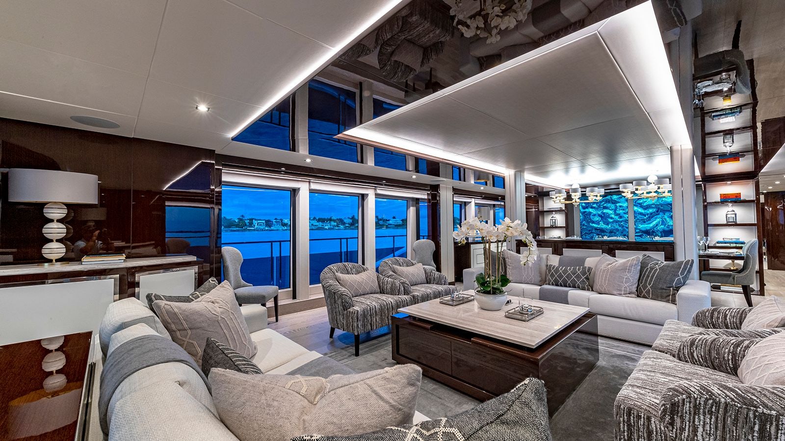 a living room with a large window aboard CAPTAIN MORGAN III Yacht for Sale