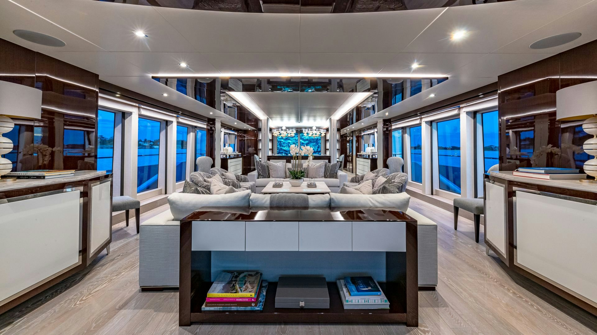 a room with a table and chairs aboard CAPTAIN MORGAN III Yacht for Sale