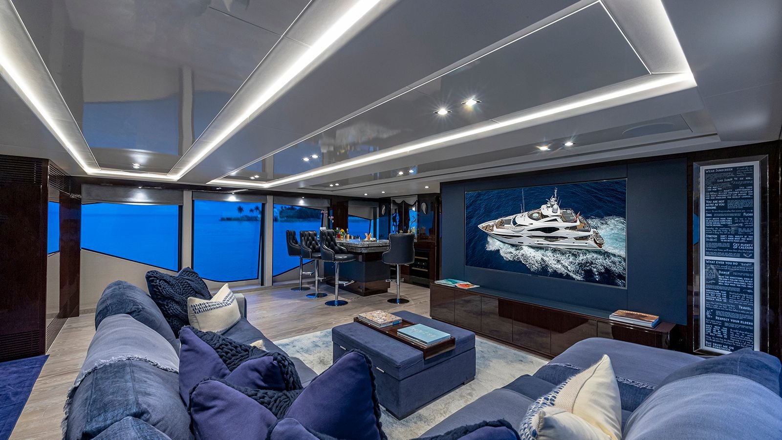 a room with a couch and a tv aboard CAPTAIN MORGAN III Yacht for Sale