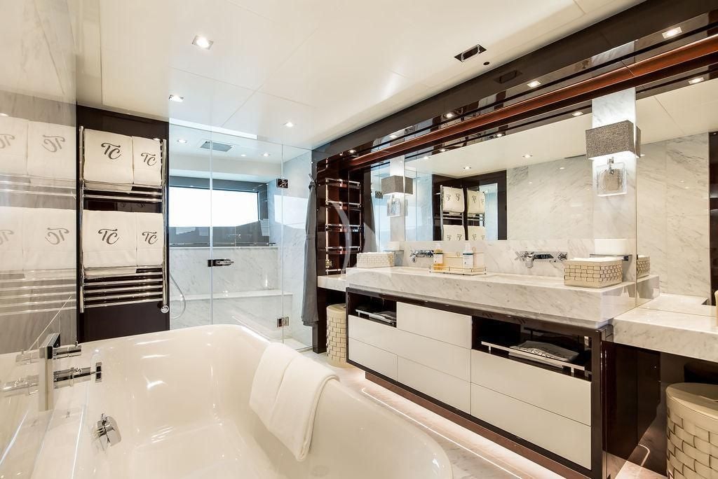 a bathroom with a large bathtub aboard CAPTAIN MORGAN III Yacht for Sale